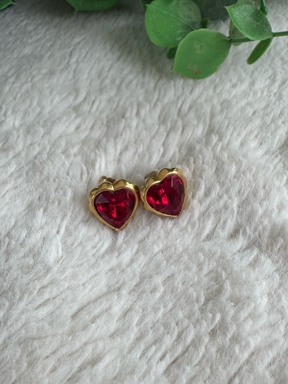 Vintage Avon gold colored earrings with faux ruby